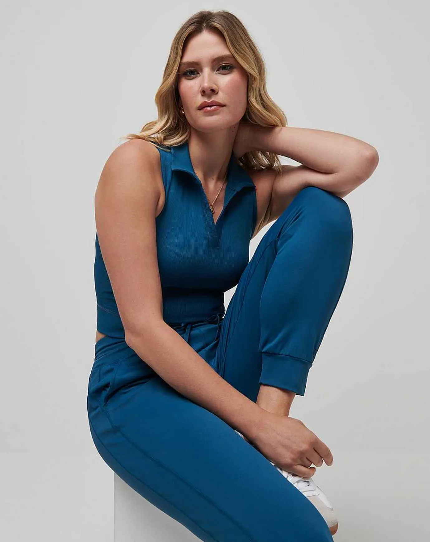 TravisMathew Moveknit Sleeveless Vneck Polo> Polos