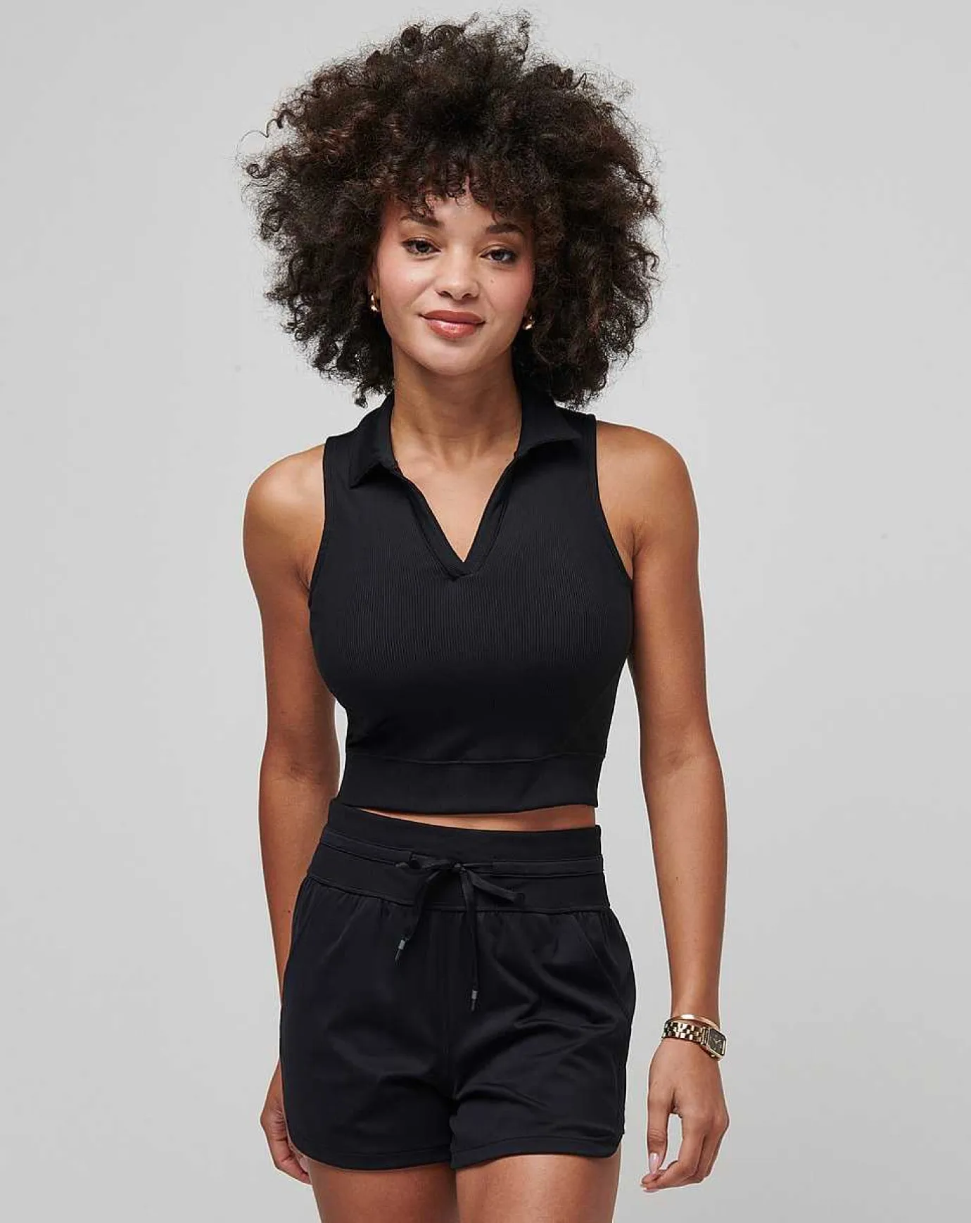 TravisMathew Moveknit Sleeveless Vneck Polo> Polos