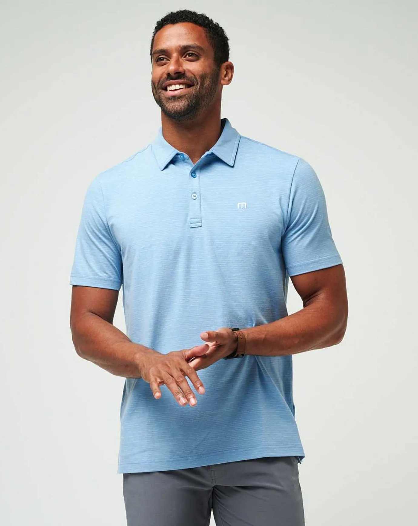 TravisMathew The Heater Polo> Polos