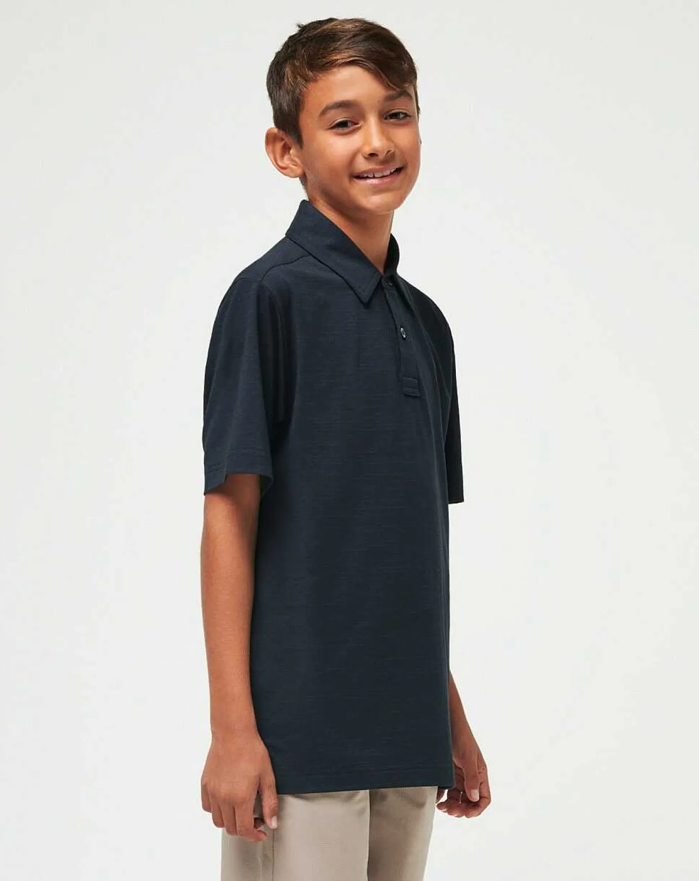 TravisMathew The Heater Youth Polo> Youth Tops